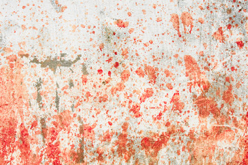 Concrete wall with blood splatters