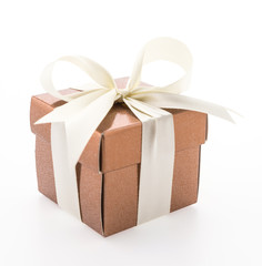 Gold gift box isolated on white background