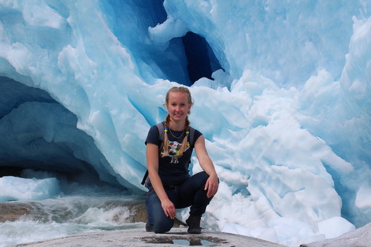 Young woman on the Nigardsbreen, glacier in Norway.