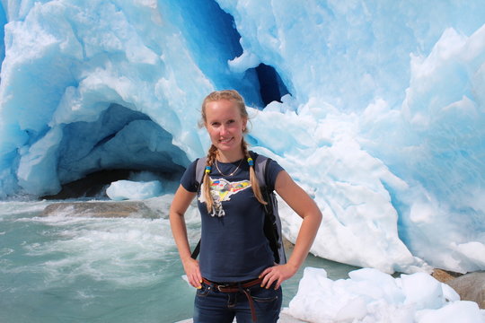 Young woman on the Nigardsbreen, glacier in Norway.