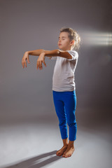 sleepwalking girl sleeps on gray background