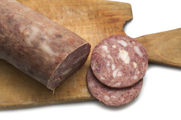 Sausage meat on a cutting board. Photo.