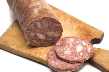 Sausage meat on a cutting board. Photo.