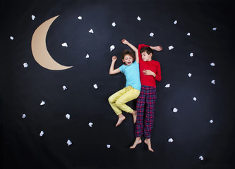Obraz na płótnie Canvas Adorable children getting ready for night sleep