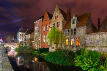 Cityscape with the picturesque night canal in Bruges