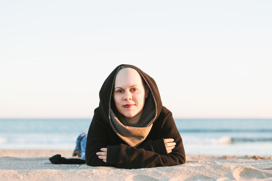 Real Female hairless fight against cancer at the beach