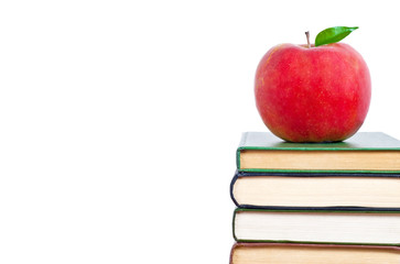 Apple and books on a white background