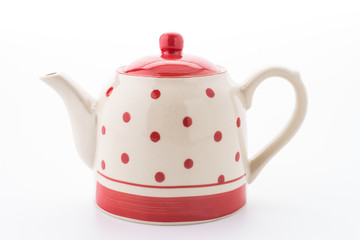 Polka dot tea pot isolated on white background