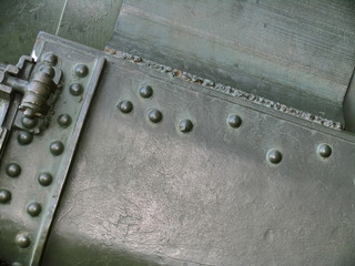 Metal texture with elements of rivets and welds on surface