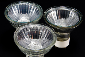 Group of No LED GU10 bulbs, lamps against a black background