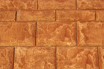 Brown cladding tiles imitating stones