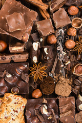 Pieces of chocolate, cookies, nuts