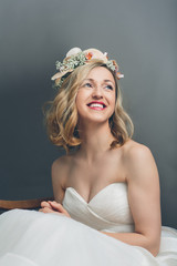 Pretty blond bride smiling with happiness