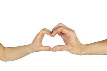 child and adult female hands forming shape of a heart