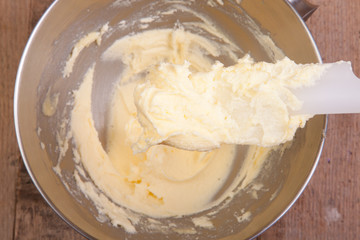 mixing butter with sugar
