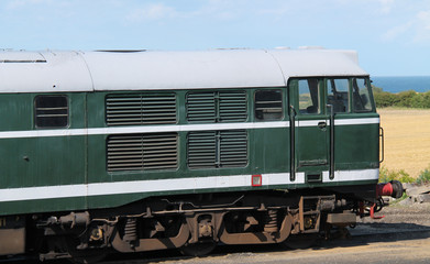 Fototapeta premium The Front of a Vintage Powerful Diesel Engine Train.