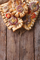 French puff cakes with red onions  vertical top view