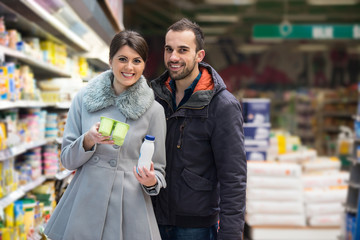 Couple Shopping In Supermarket