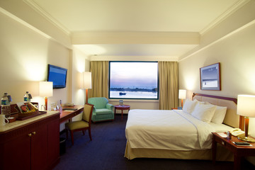 Immerse Yourself in Luxury: Five-Star Hotel Room with Elegant Interior and Breathtaking Beach Views | Relax in Style with Stunning Ocean Scenery Right Outside Your Window