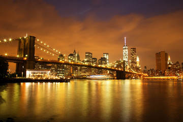 Obraz na płótnie Canvas New York City Manhattan Downtown with Brooklyn Bridge at dusk