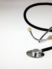 Medical stethoscope on a white background.