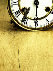 Fototapeta na wymiar Old clock with roman numerals.