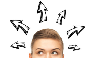 close up of woman looking to arrow doodles