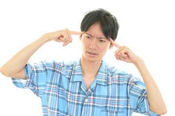 頭痛を訴える男性