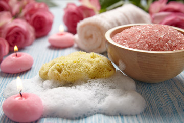 Close-up of candles and flowers