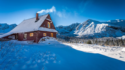 Warm accommodation in a mountain cottage in winter
