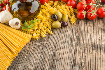 Italian food ingredients wooden background