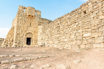 Main entrance of Qasr Azraq is a large fortress in Azraq, Jordan