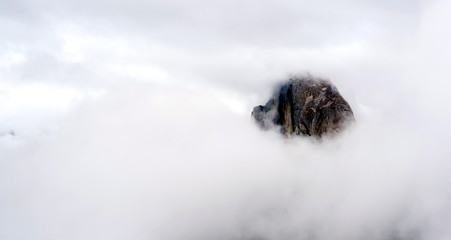 Clouds and Fog Move in Covering Half Dome Yosemite