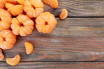 Tangerines on wooden table