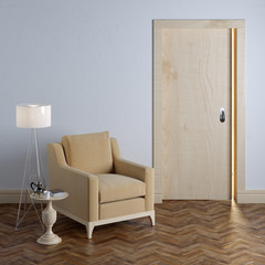 Textile beige armchair and wooden door in classic interior