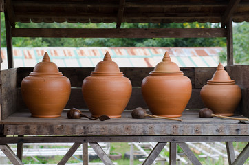 Fototapeta na wymiar Large earthenware water container is the Thai way of life