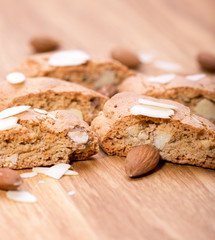 Cantuccini on wooden background, typical tuscan biscuits