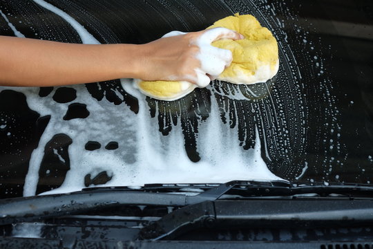 car wash with a sponge and soap