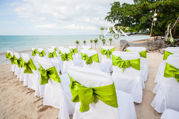 Decorative Bows on a Row of Chairs