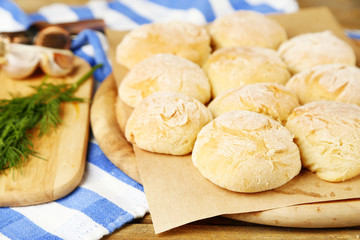 Fresh homemade bread buns from yeast dough and fresh garlic,