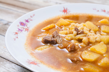 A dish of traditional Hungarian goulash, closeup