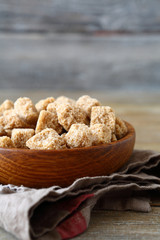 sugar in a wooden bowl