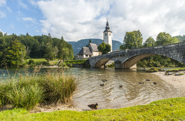 Fototapeta na wymiar Bohinj lake with church and bridge, Slovenia
