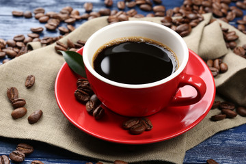 Cup of coffee on wooden table