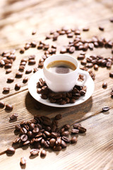 Cup of coffee on wooden table