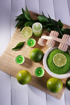 Spa composition with lime and bowl of sea crystals