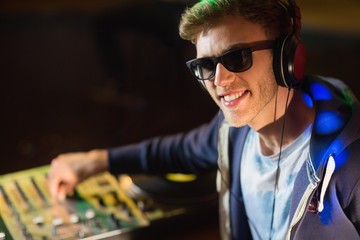Cool dj smiling at camera