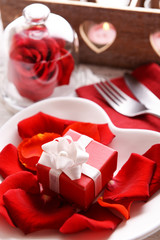 Festive table setting for Valentines Day on table background