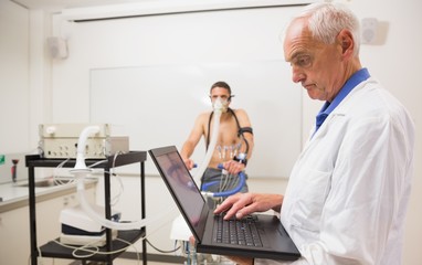 Man doing fitness test on exercise bike