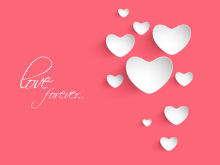 Glossy hearts on pink background for Happy Valentines Day.